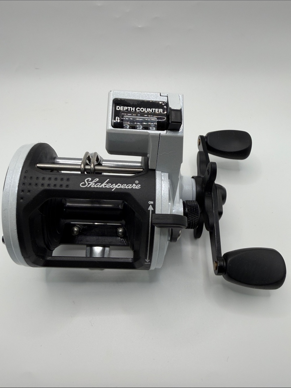 Shakespeare ATS trolling White & Black Depth Counter Fishing Reel